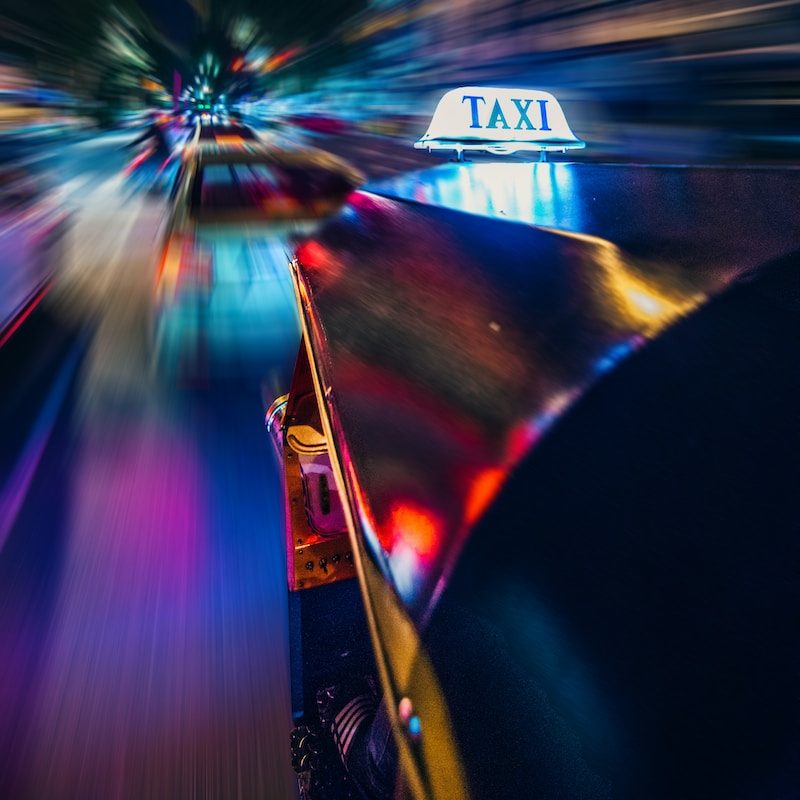 yellow taxi time lapse photography